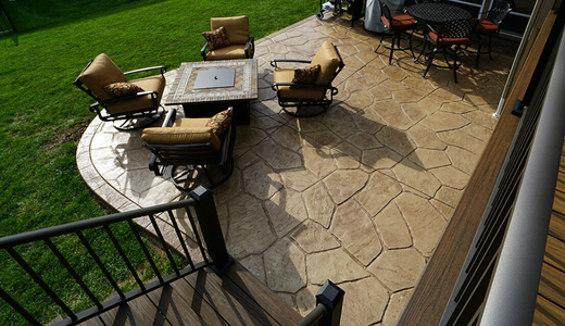 Custom stamped concrete patio with ashlar stone pattern in Olathe, Kansas